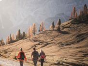 Three people hiking in the Dolomites